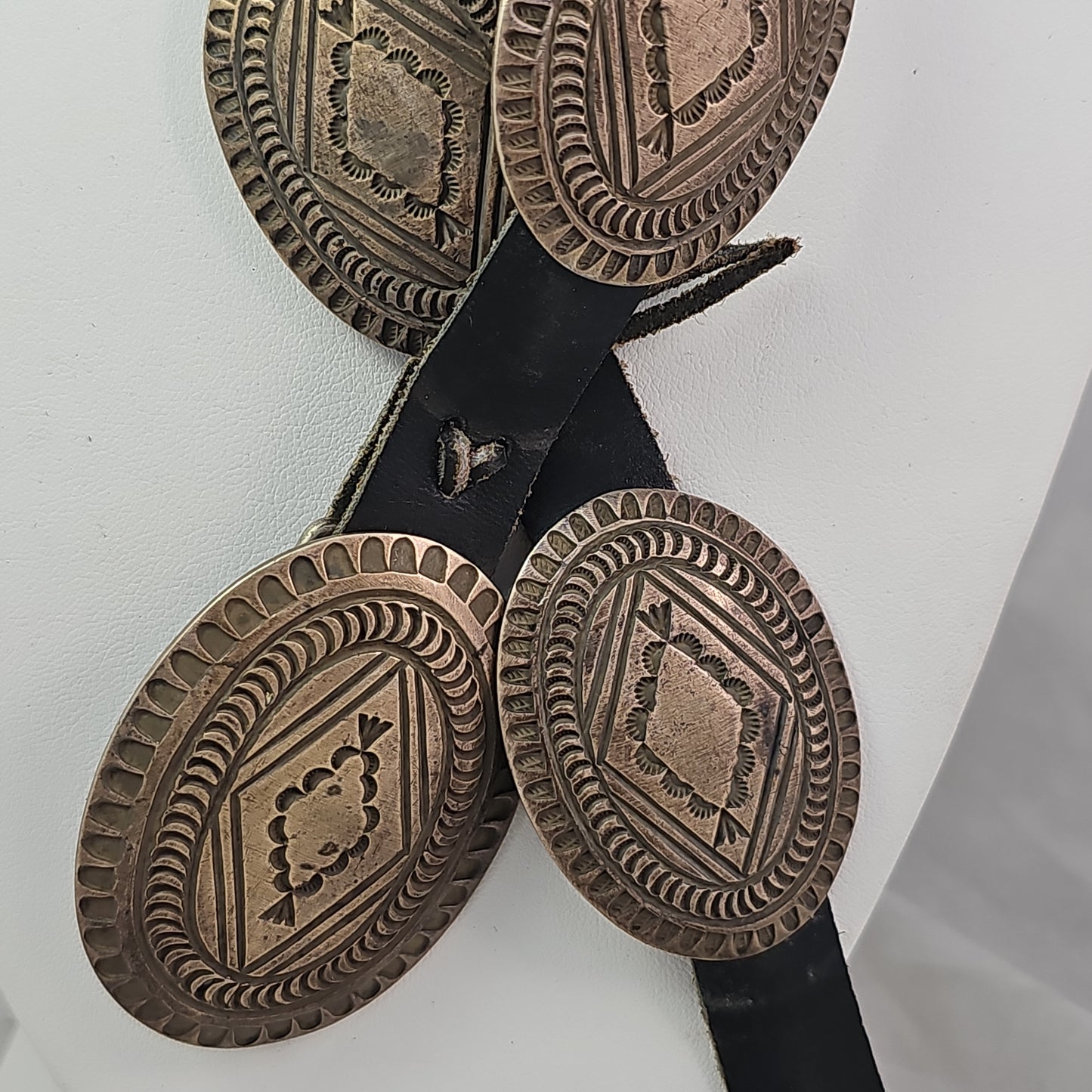 Rug pattern concho belt