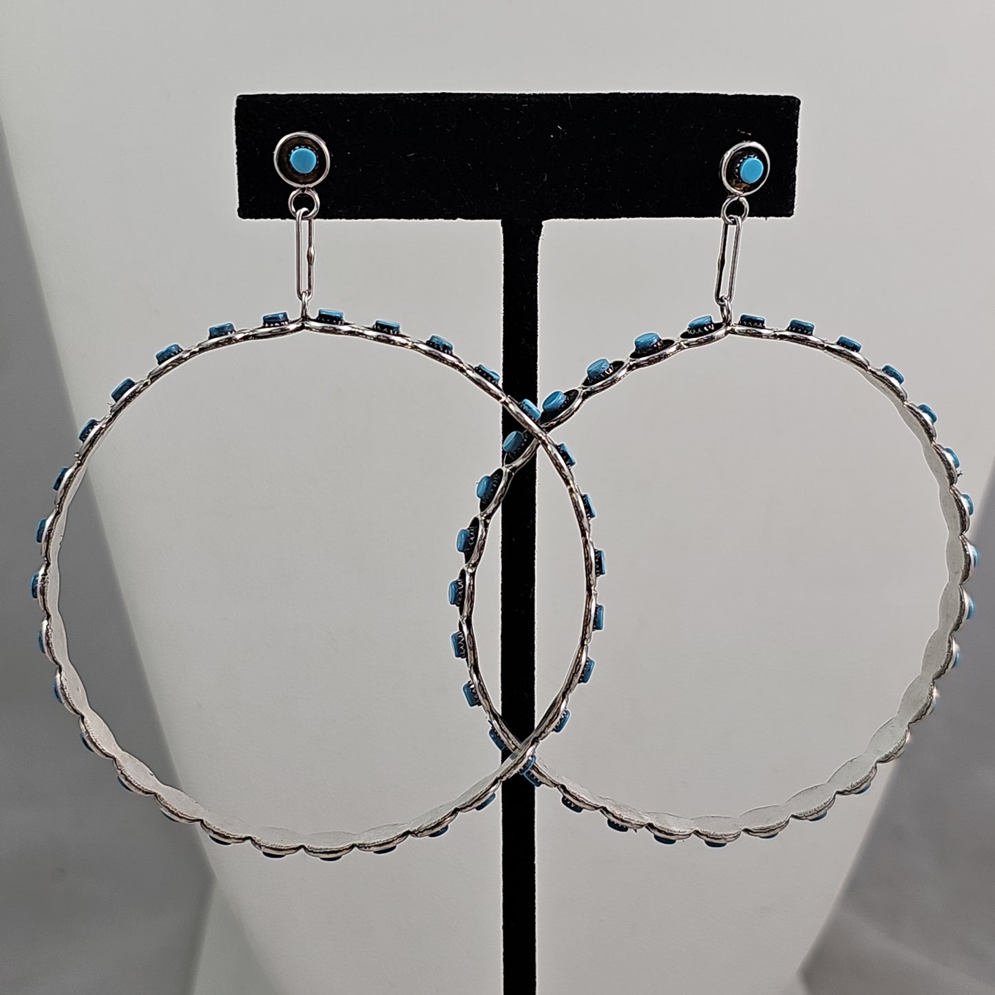 Snake eye hoop earrings