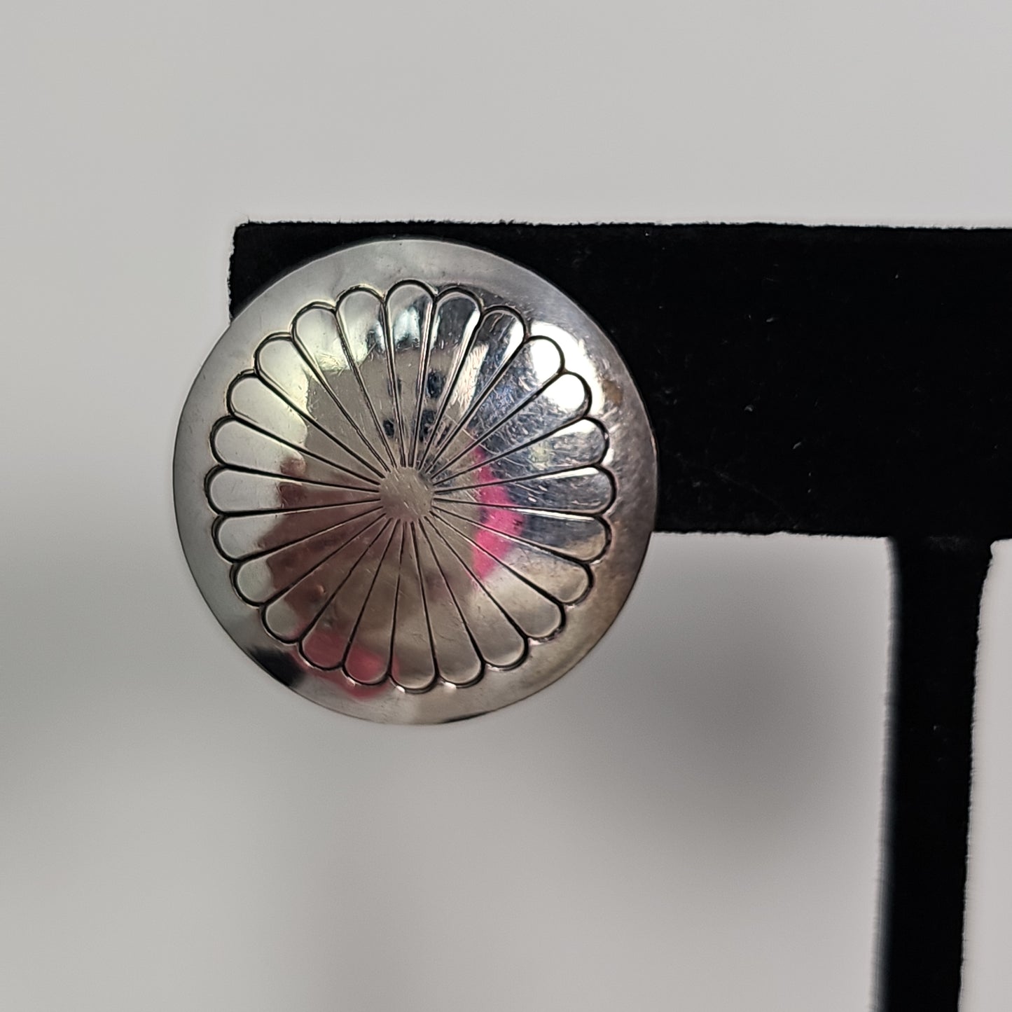 Dome sterling concho earrings.