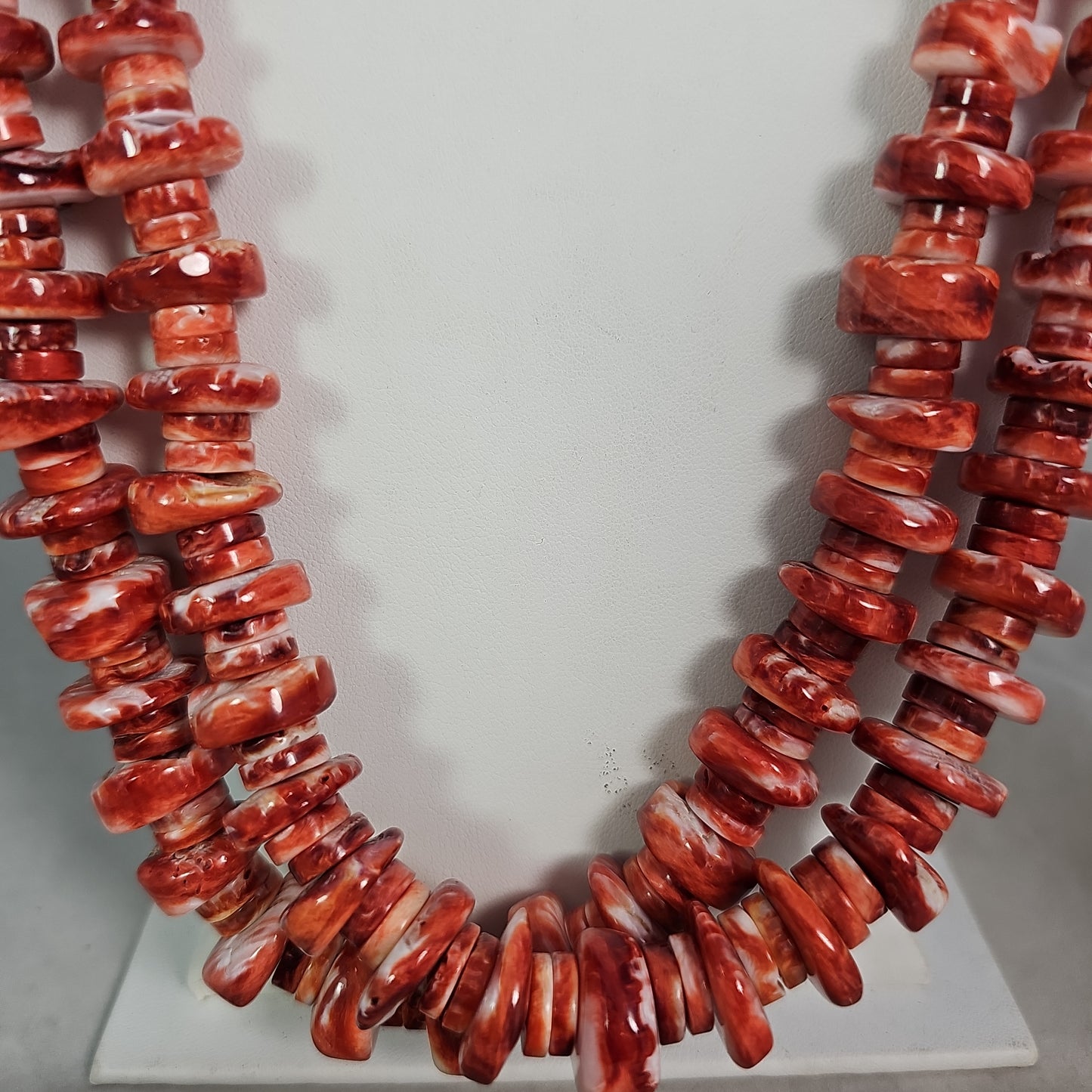 Lupe Lovato Santo Domingo spiney oyster necklace.