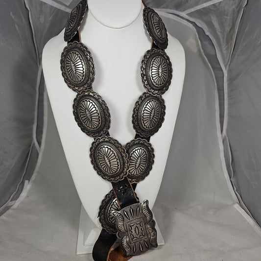 Heavy sterling Navajo concho belt