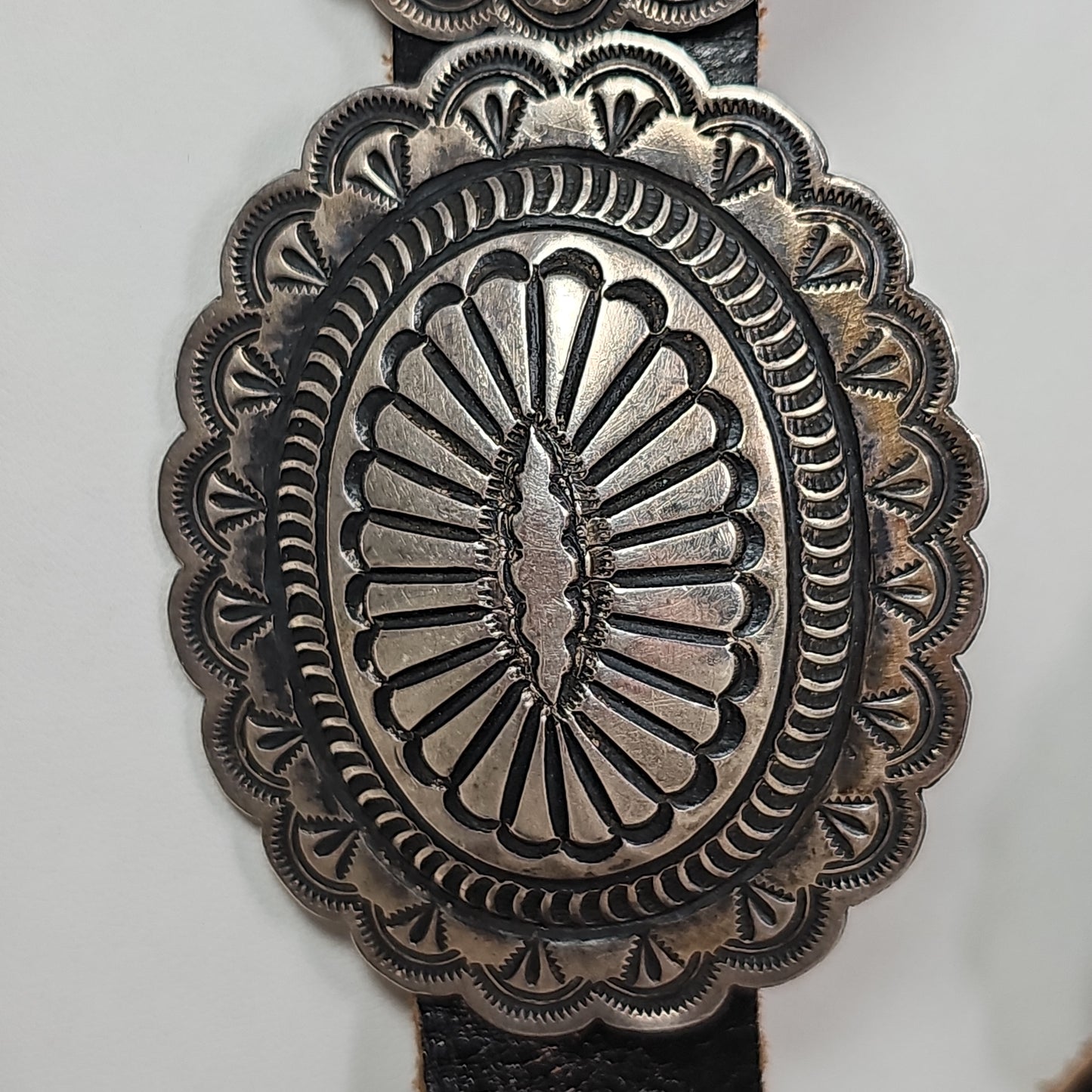 Heavy sterling Navajo concho belt