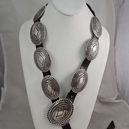 Rug pattern concho belt