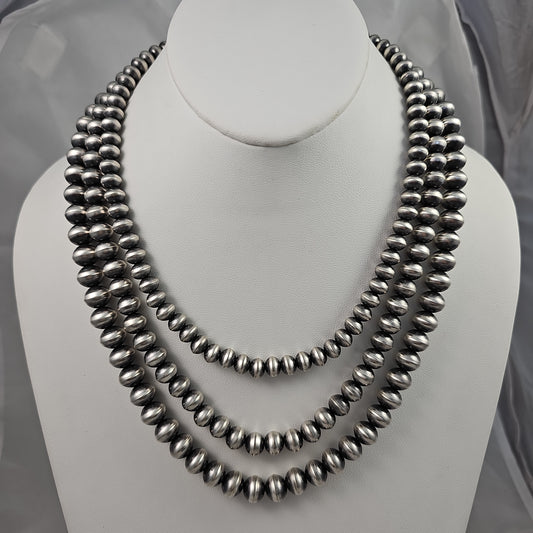 Triple strand Navajo pearl necklace
