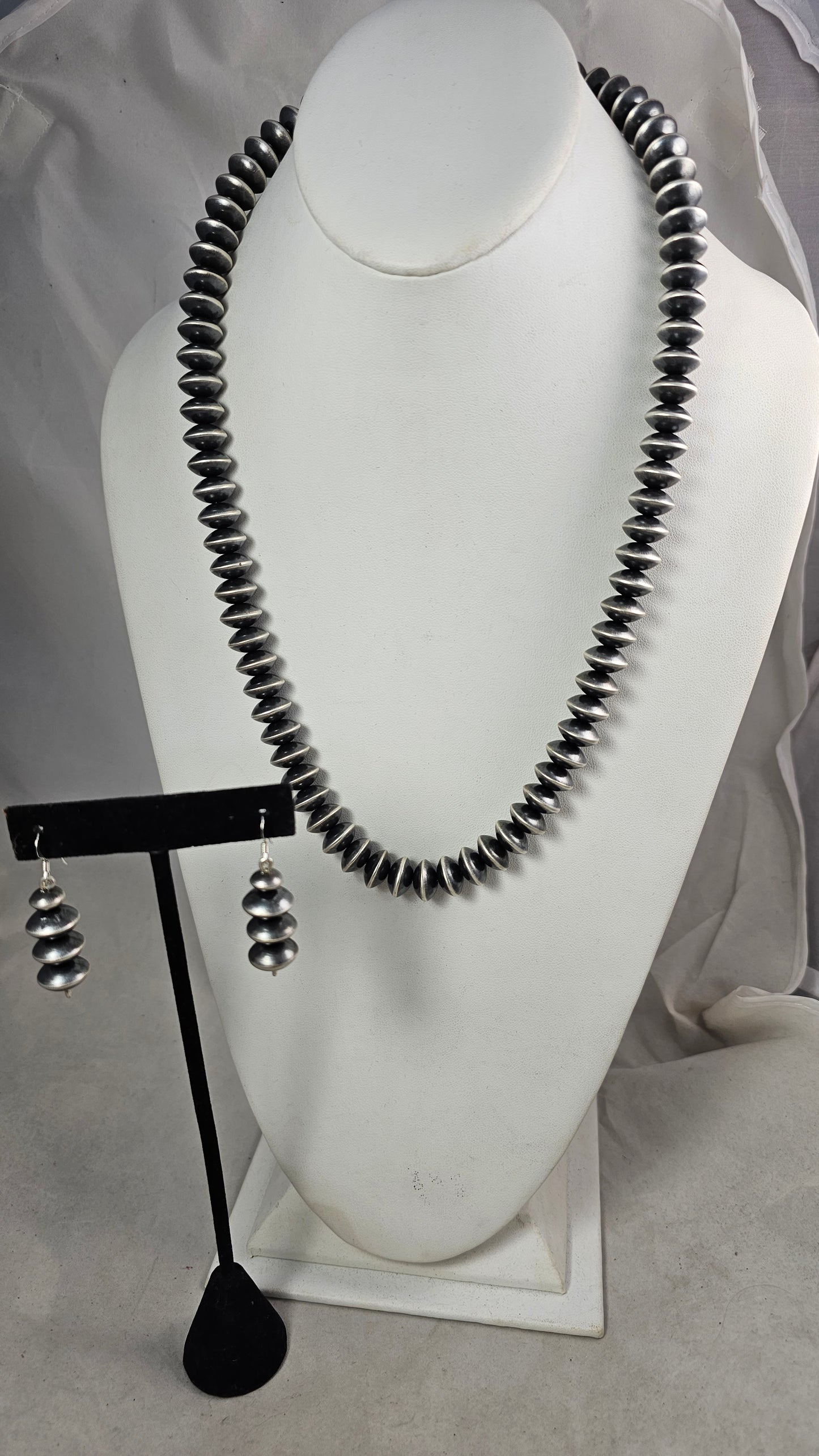 Rondelle style Navajo pearls with matching earrings.
