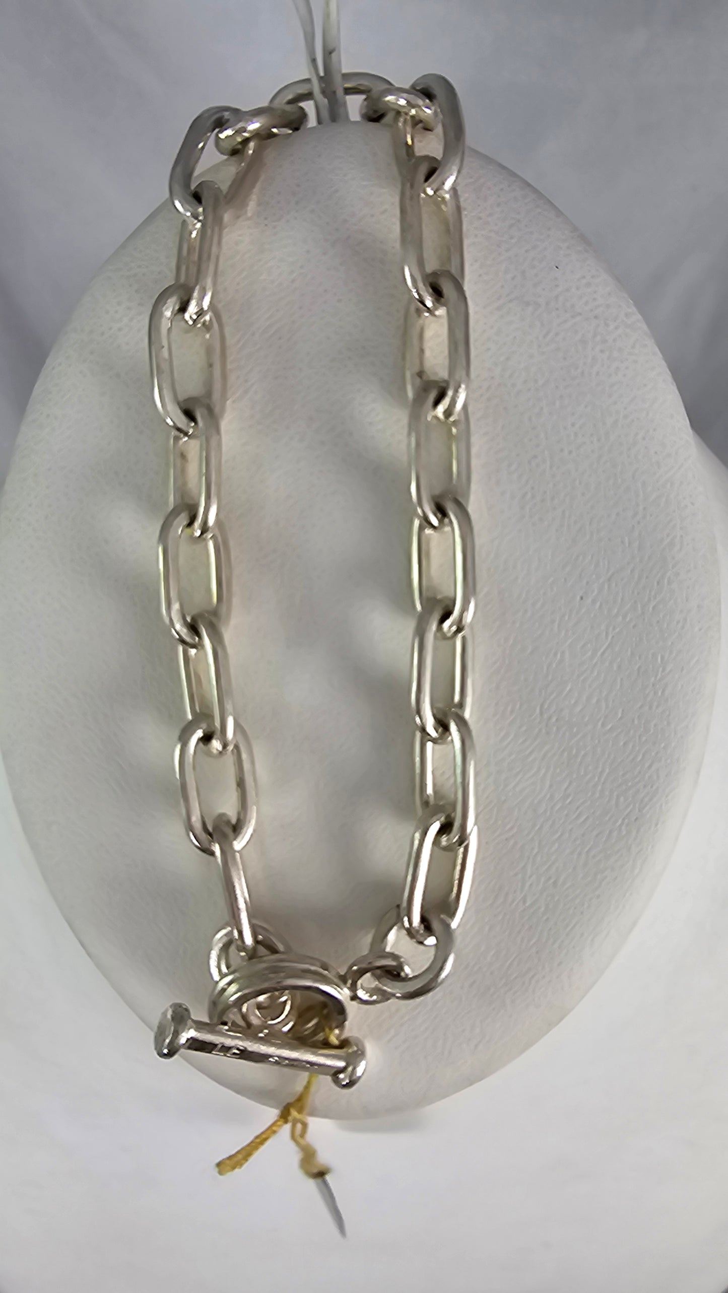 Native American handmade sterling heavy link bracelet with toggle clasp. Signed