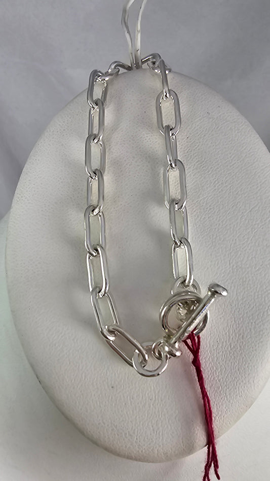 Native American handmade sterling heavy link bracelet with toggle clasp. Signed
