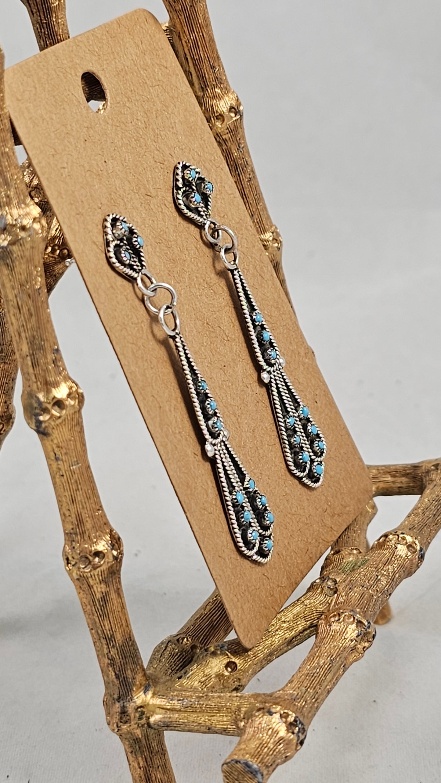 Snake eye neck tie design earrings