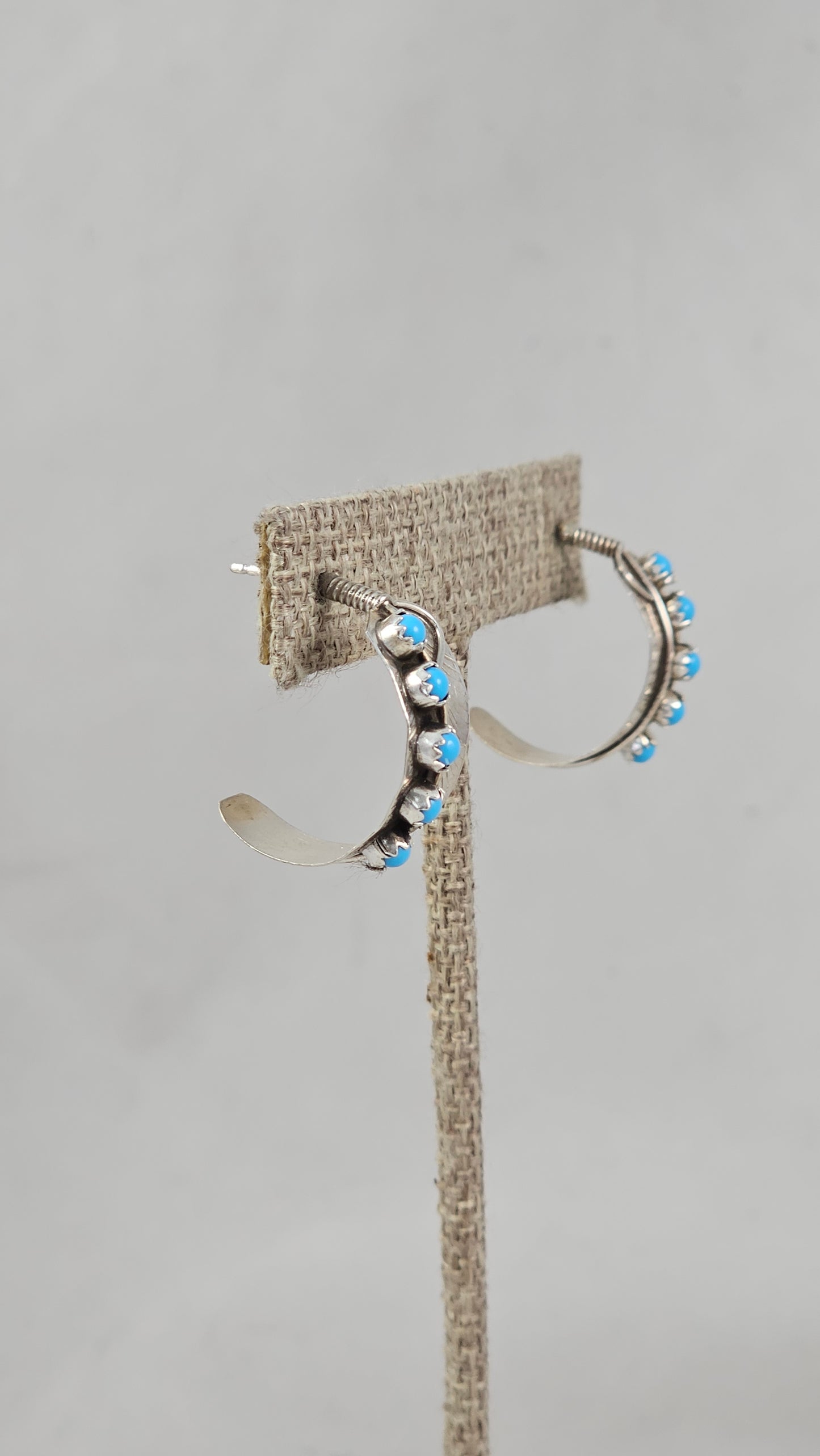 Feather hoop earrings