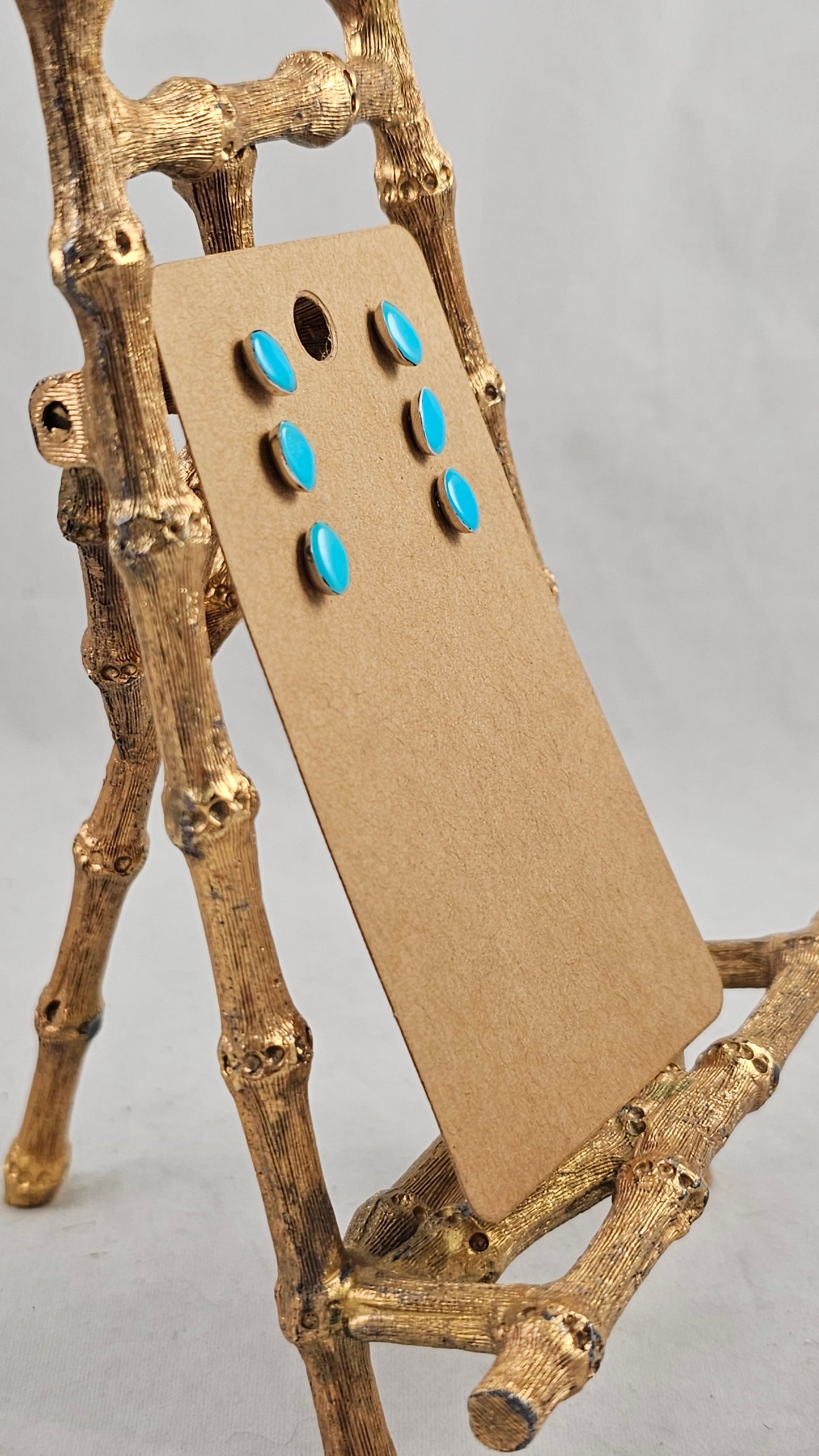 Turquoise oval eracer studs