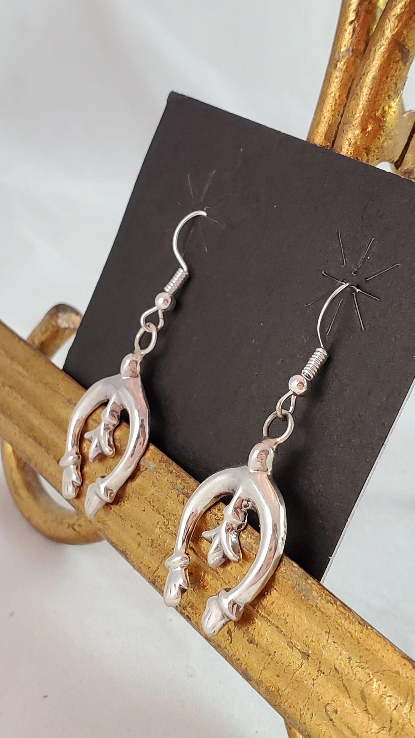 Cast silver naja - Albuquerque Pawn Shop