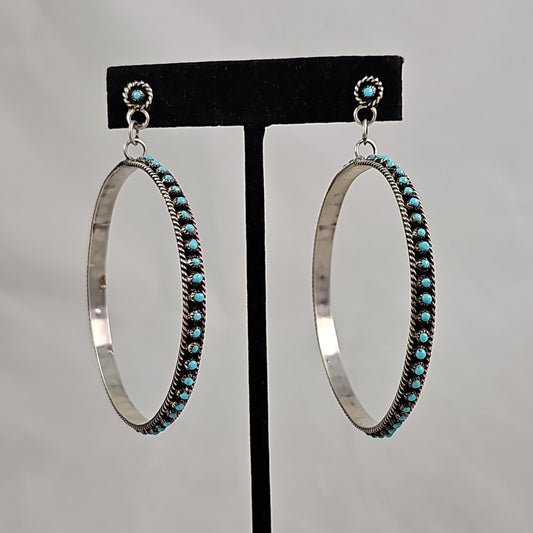 Large snake eye hoop earrings