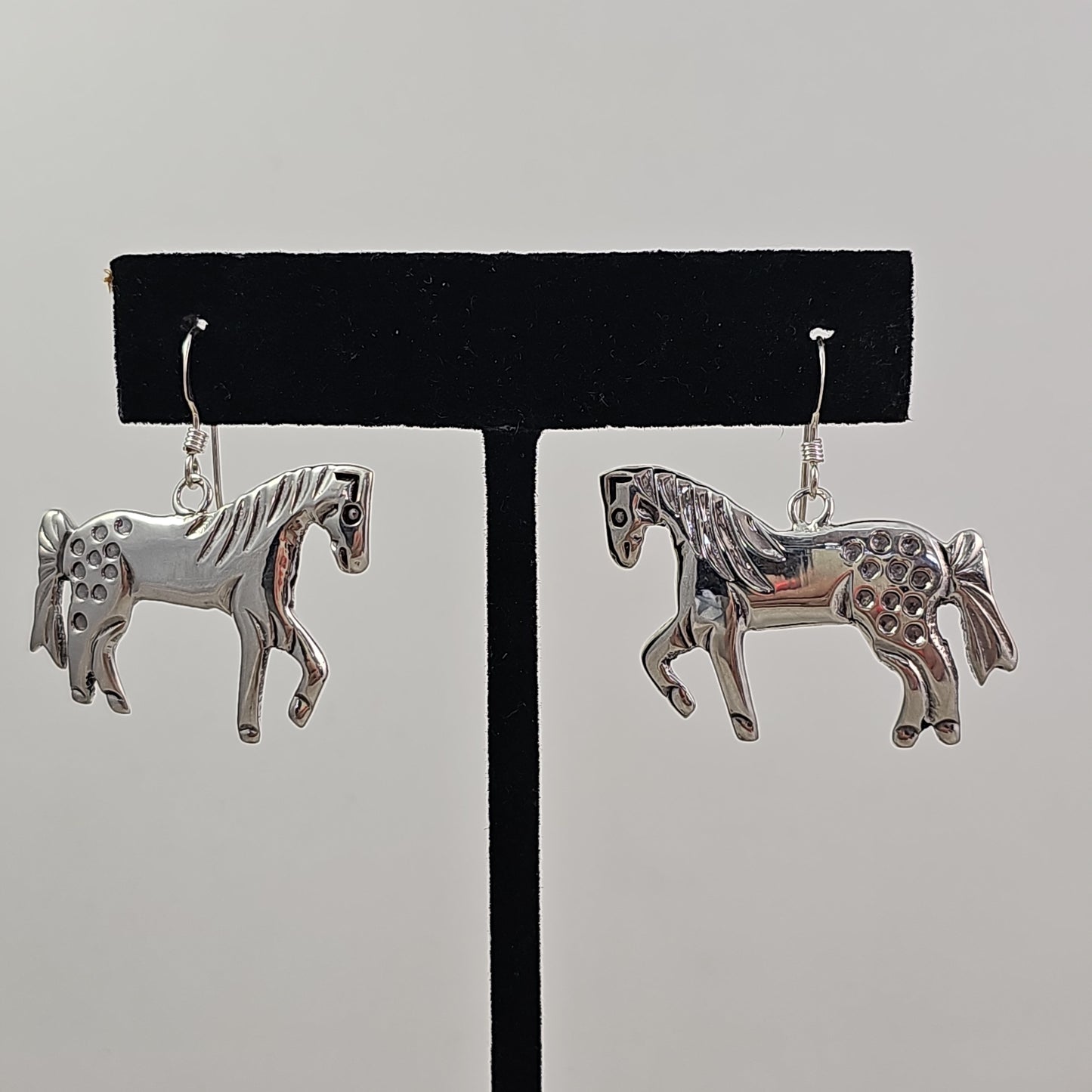 Prancing spotted horse earrings