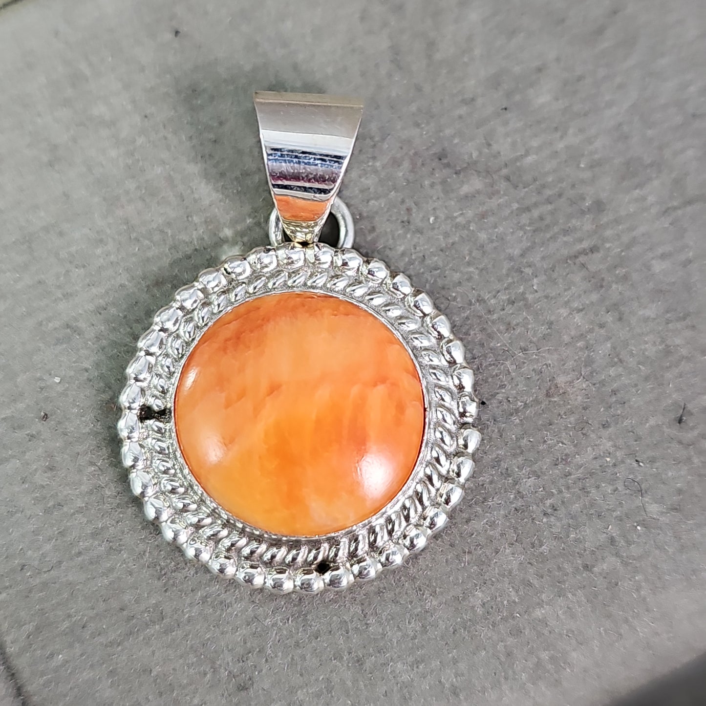 Spiney oyster pendant