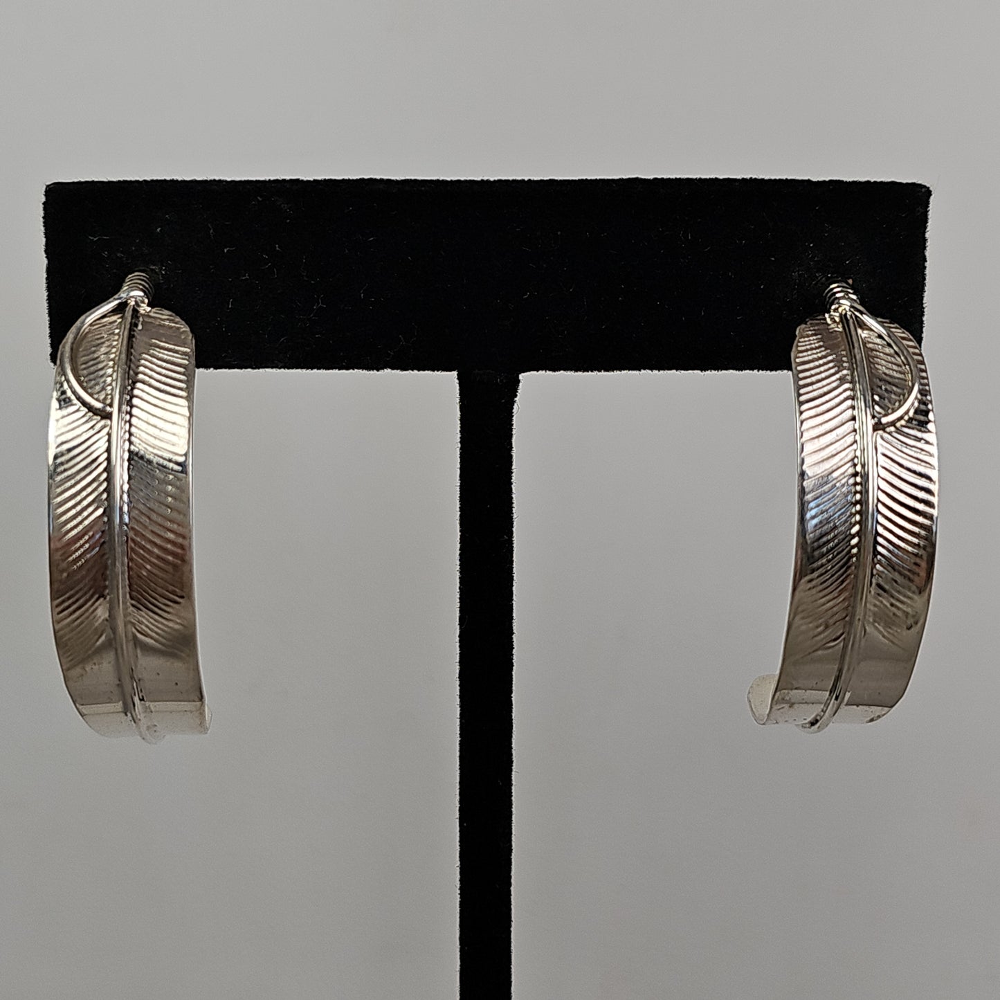 Feather hoop earrings