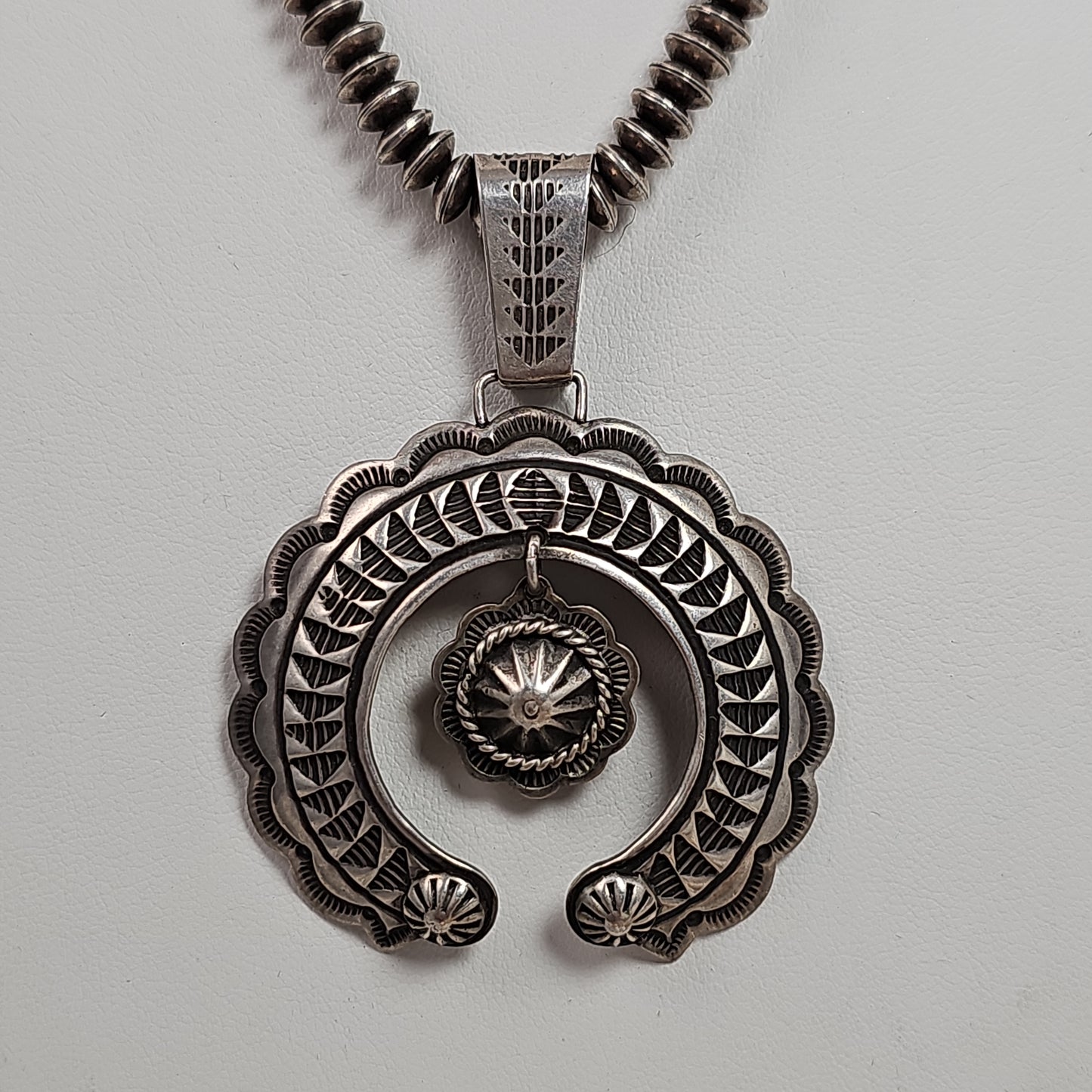 Naja pendant on Rondelle Navajo pearls