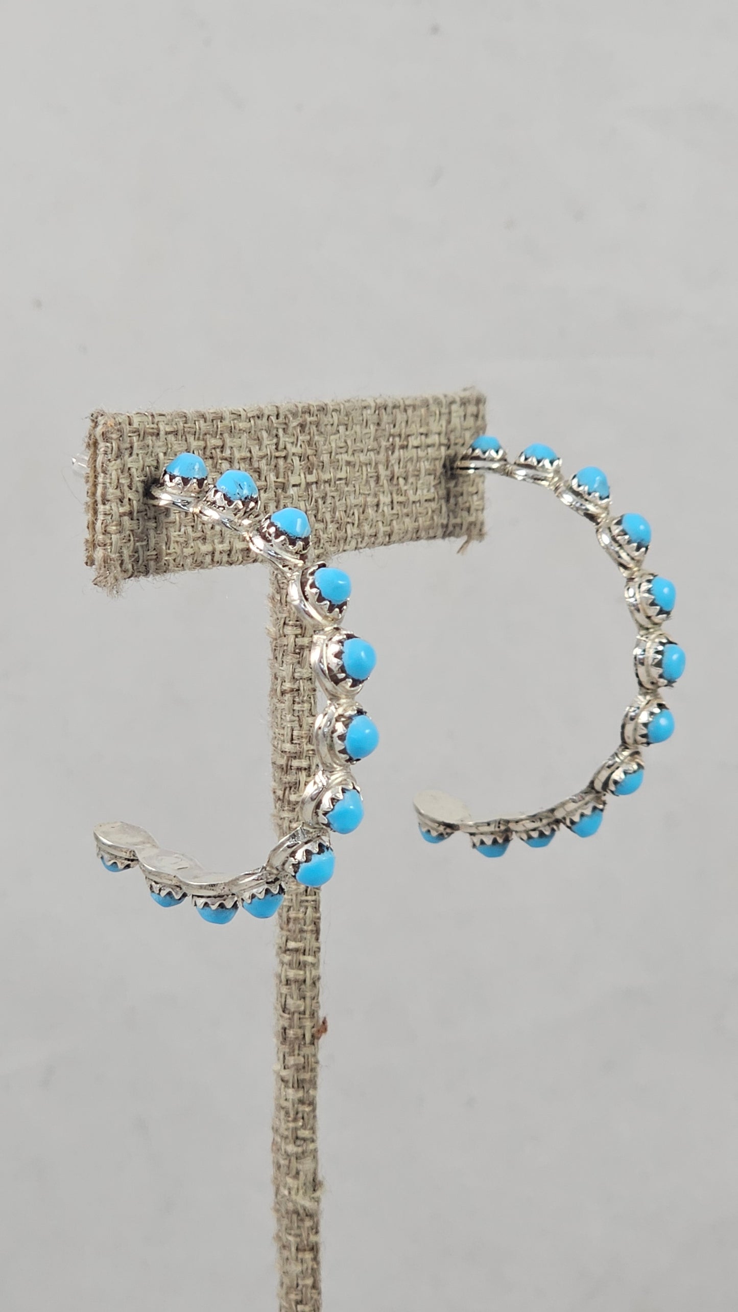 Snake eye hoop earrings