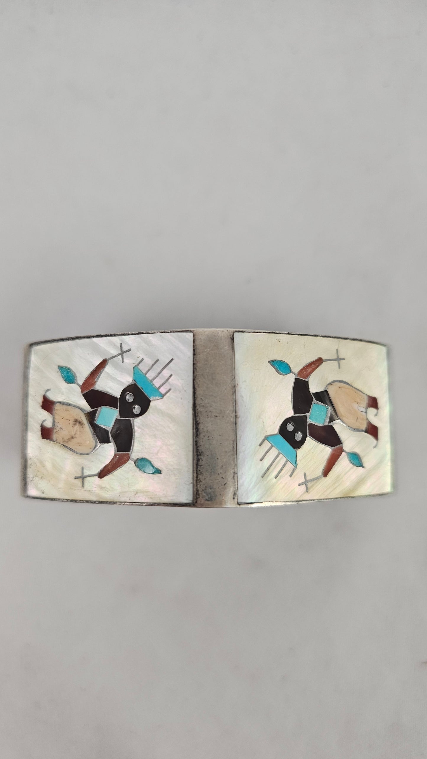 Vintage Zuni kachina inlay cuff by Tony Ohmsatte