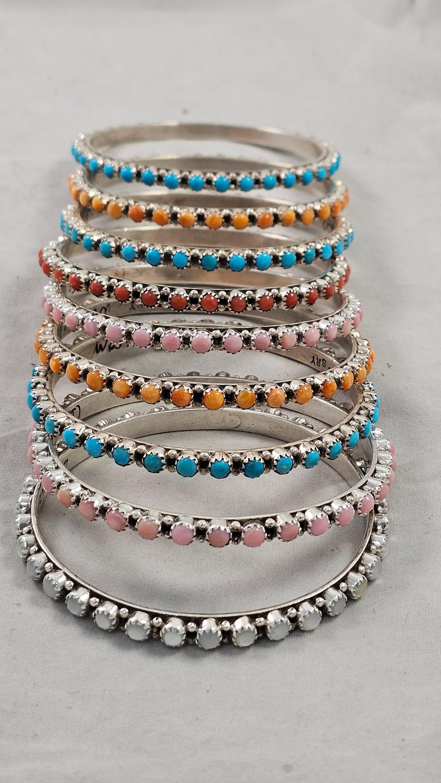 Snake eye bangle bracelets.