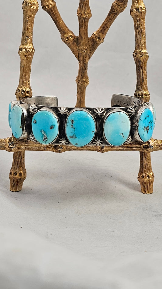 Steer head turquoise and sterling button cuff