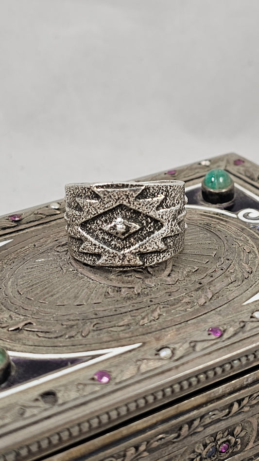 Tufa cast rug pattern ring by Anthony Bowman