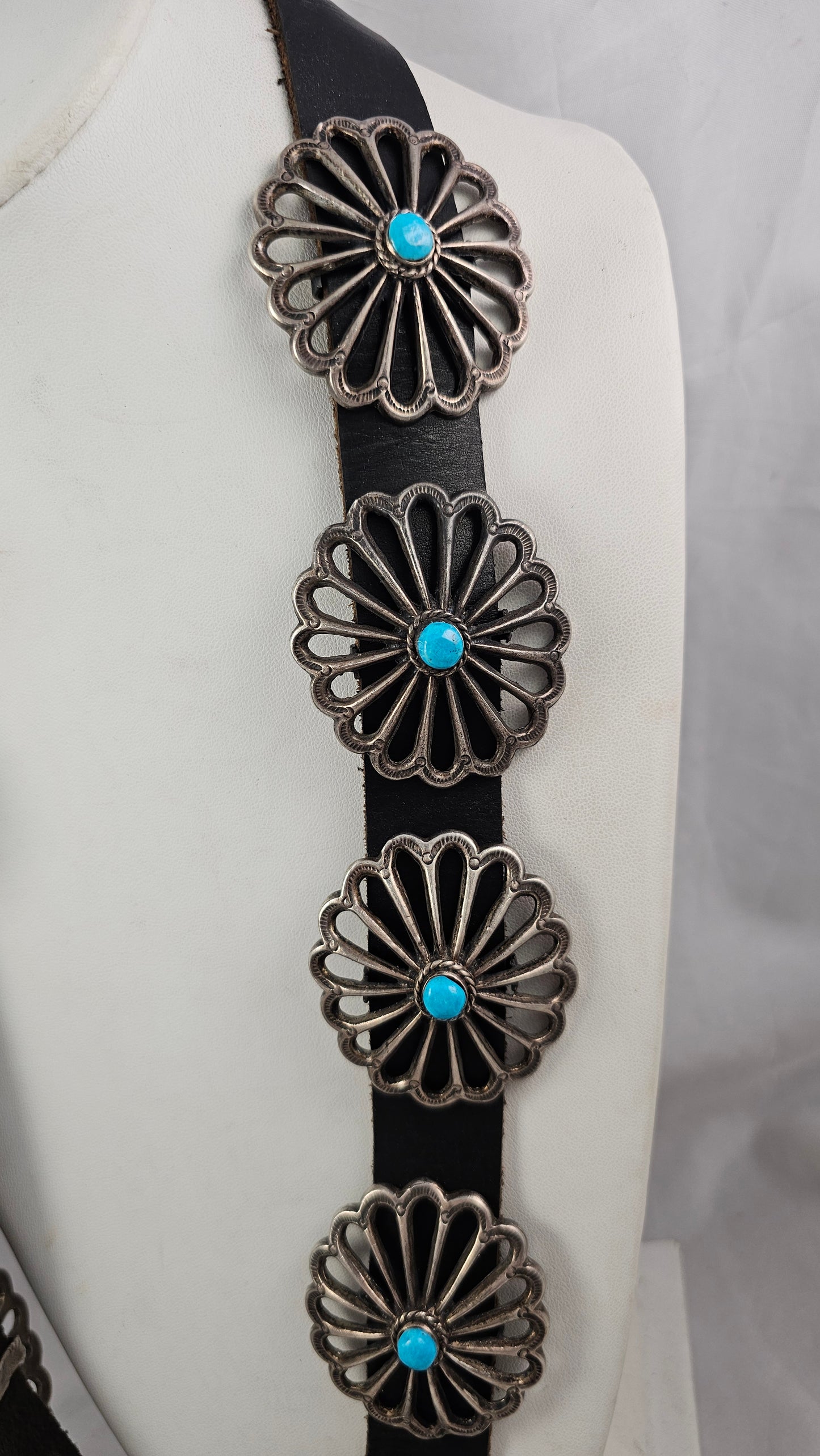 Sandcast concho belt