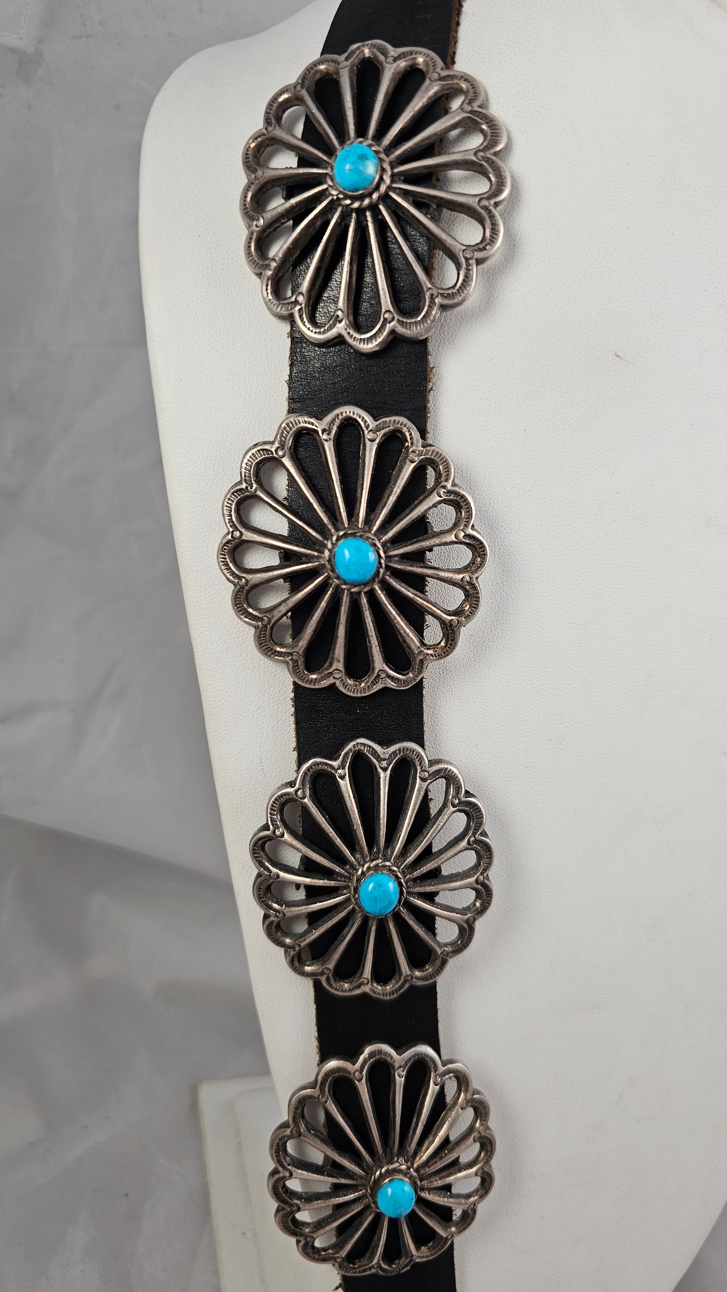 Sandcast concho belt