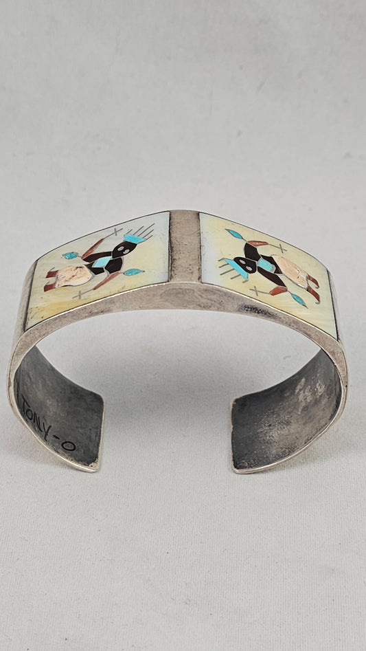 Vintage Zuni kachina inlay cuff by Tony Ohmsatte