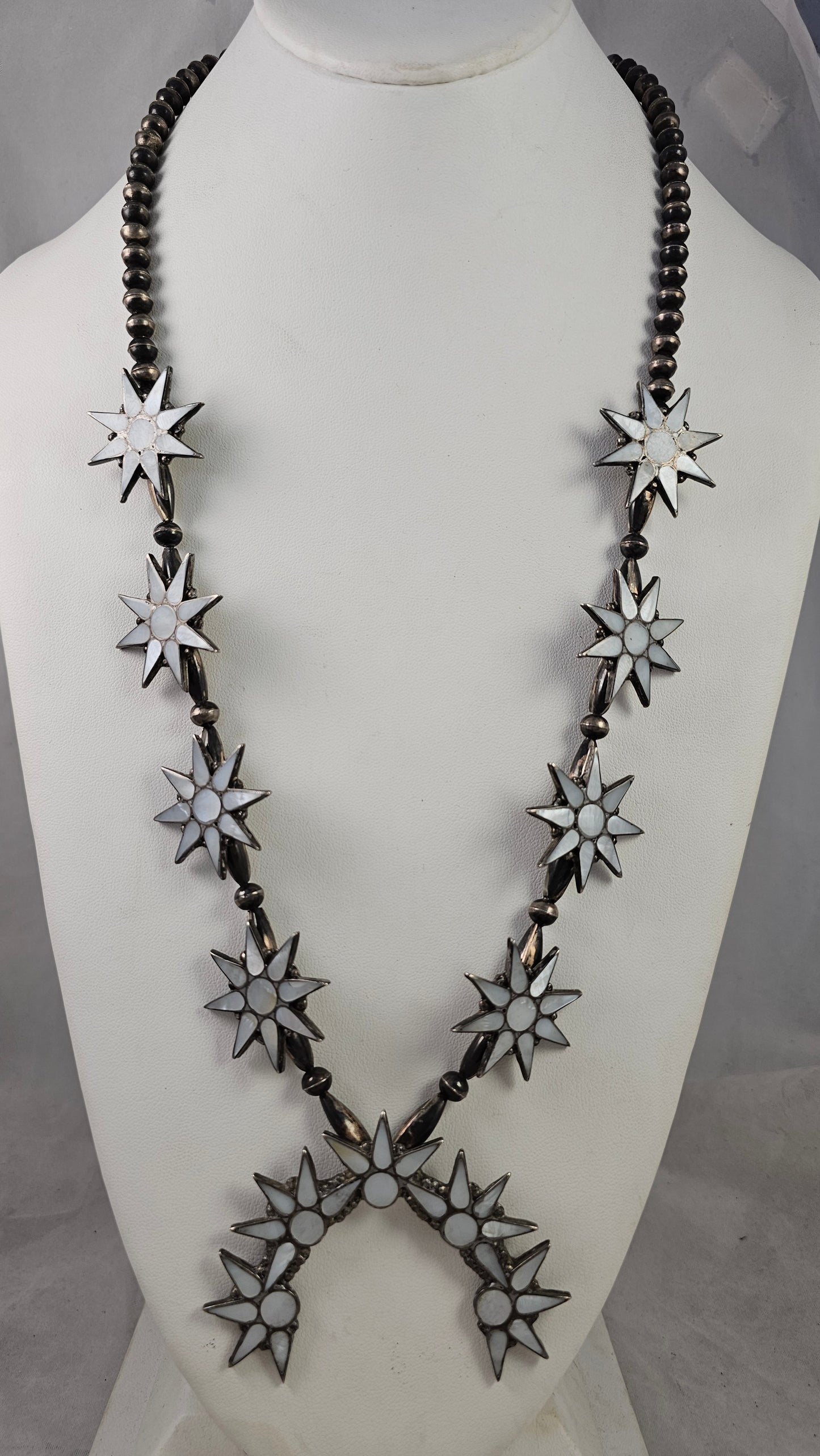 Mother of pearl squash blossom