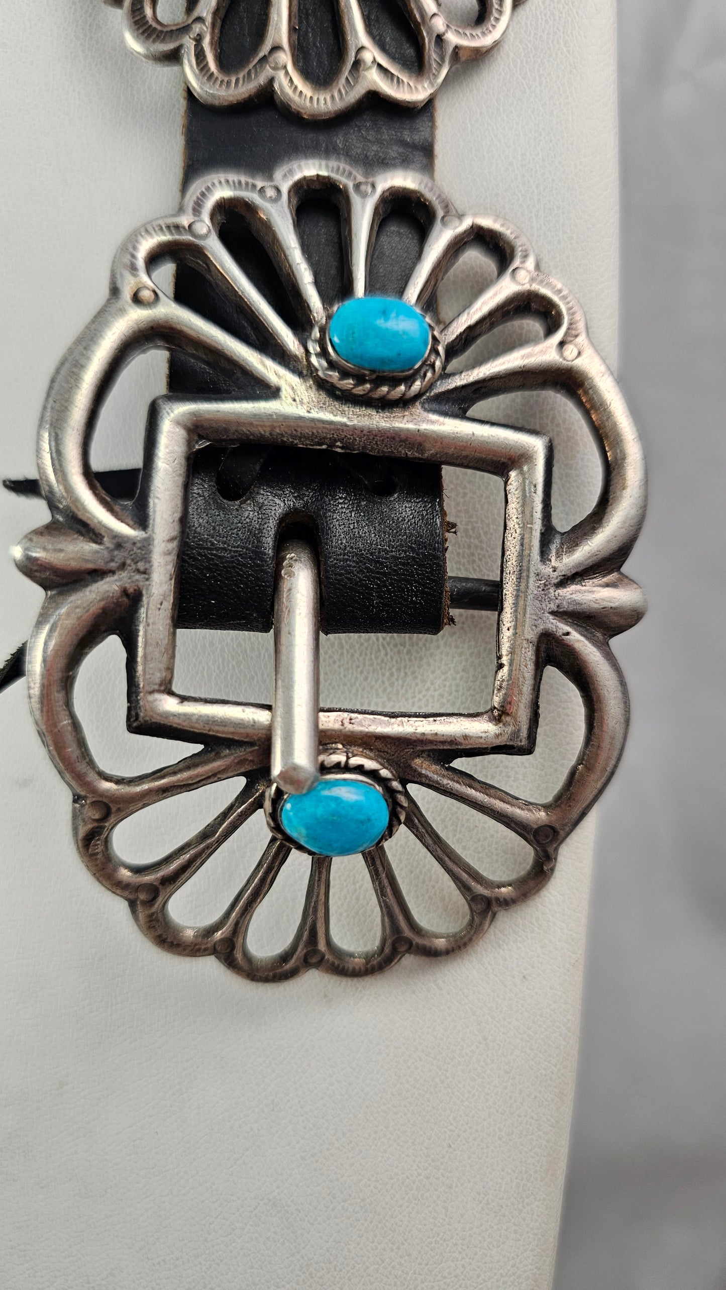 Sandcast concho belt