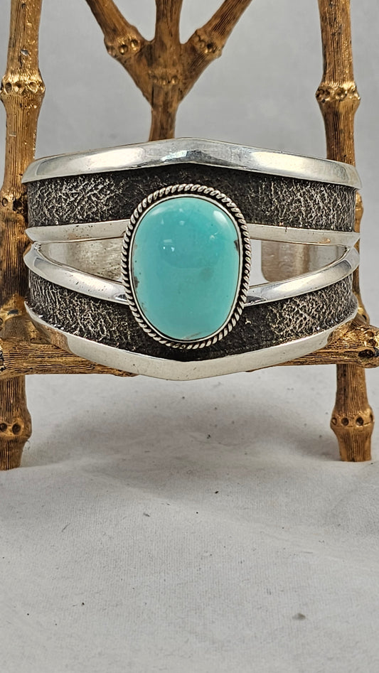 Turquoise and sterling tufa cast cuff