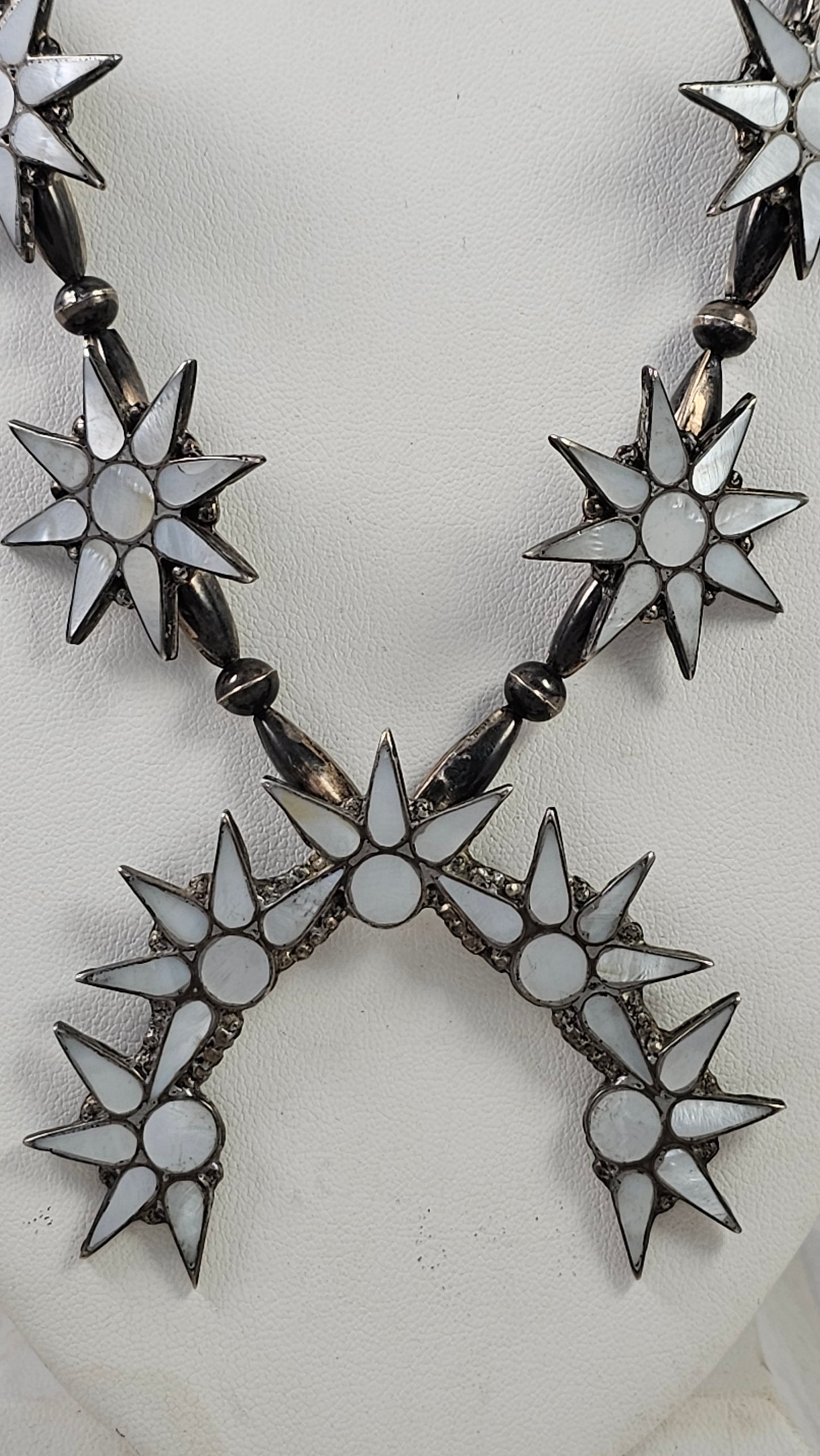 Mother of pearl squash blossom