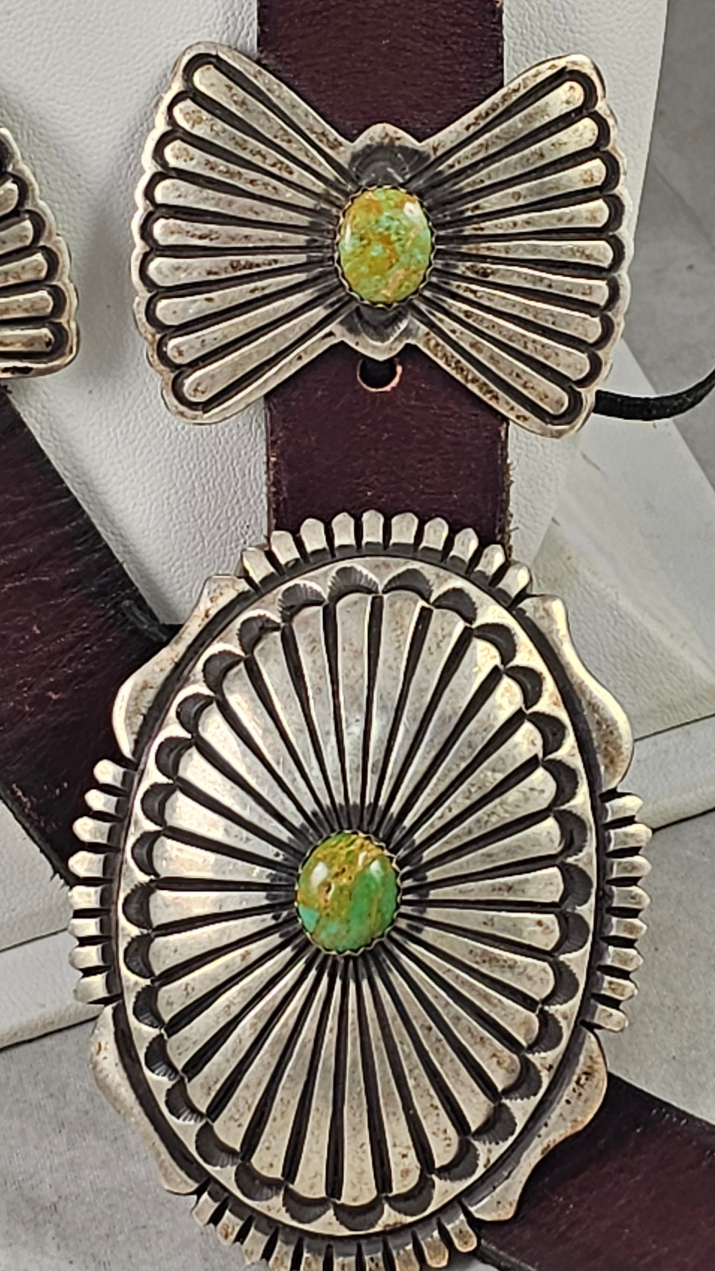Concho belt by Leon Martinez