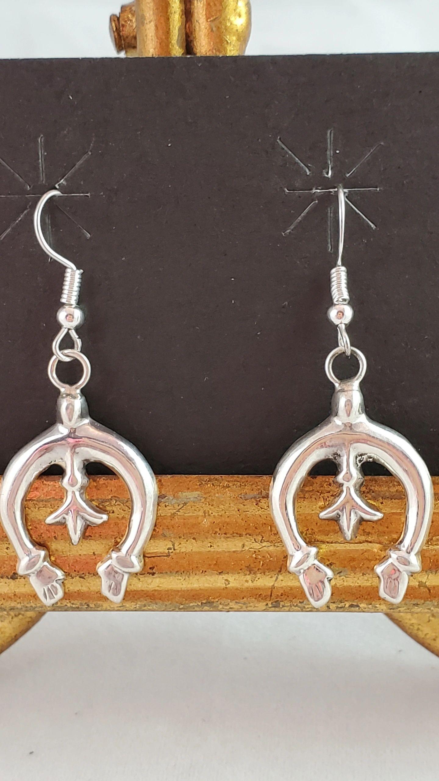Cast silver naja earrings - Albuquerque Pawn Shop